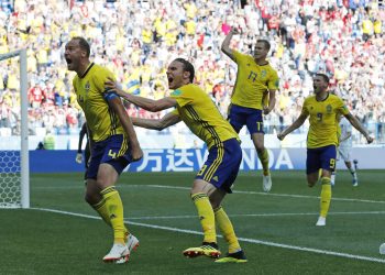 Andreas Granqvist (L)  celebrates after scoring the winner against South Korea at the Nizhny Novgorod stadium in Nizhny Novgorod, Russia
