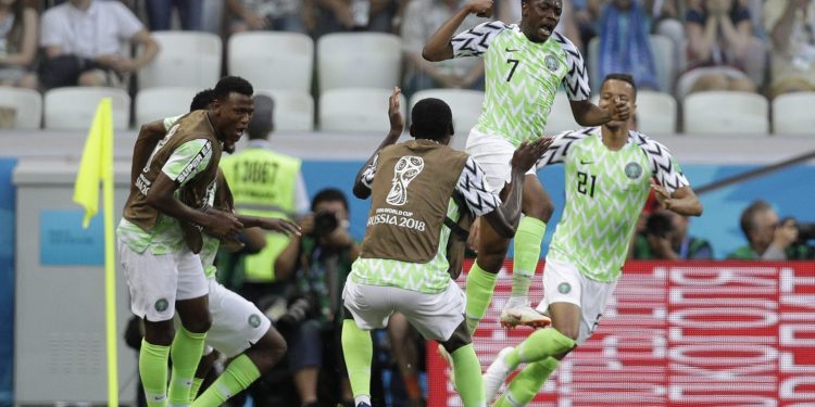 Ahmed Musa (No.7) celebrates with teammates after scoring the second goal for Nigeria against Iceland, Friday