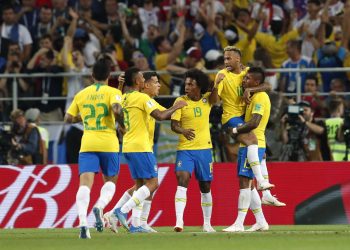 Paulinho (far R) celebrates with teammates after scoring against Serbia at the Spartak Stadium in Moscow