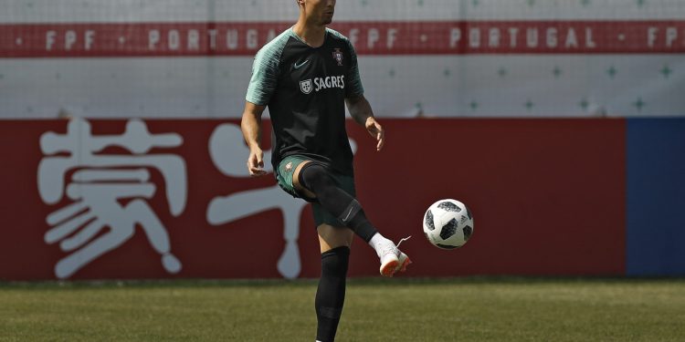 Cristiano Ronaldo plays the ball with during the training session of Portugal in Kratovo, Russia, Saturday