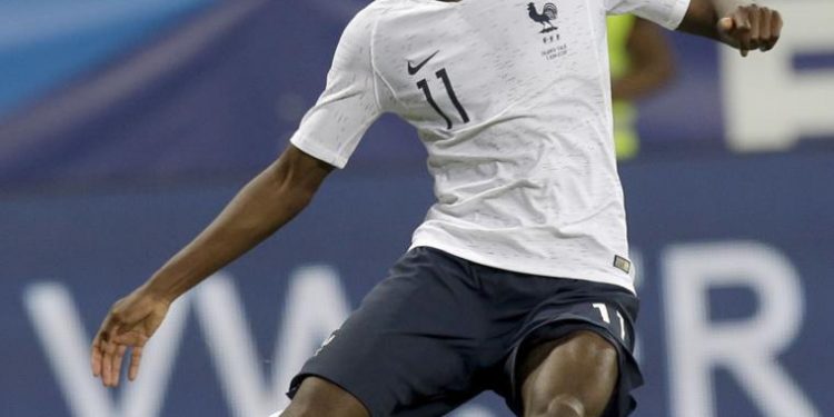 Stunning strike: France forward Ousmane Dembele about to connect his shot for his side’s third goal against Italy at Nice, Friday