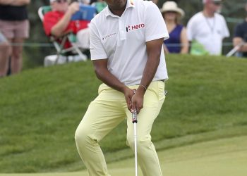 Anirban Lahiri reacts after missing a put, Sunday