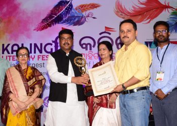 Author Amish Tripathi receiving the Kalinga International Literary Award from Union Minister Dharmendra Pradhan, Friday OP PHOTO