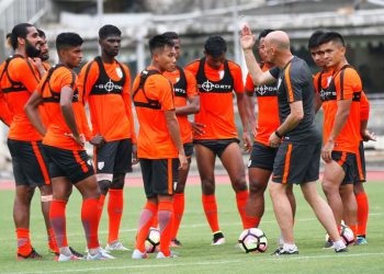 India coach Stephen Constantine gives instructions to his players ahead of their final game against Kenya at the Mumbai football arena, Friday  