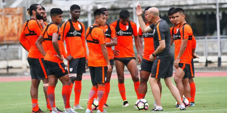 India coach Stephen Constantine gives instructions to his players ahead of their final game against Kenya at the Mumbai football arena, Friday  