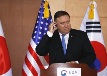 US Secretary of State Mike Pompeo listens to a translation during a joint news conference with his South Korean and Japanese counterparts at the Foreign Ministry in Seoul on June 14, 2018. 
North Korea's Kim Jong Un understands that denuclearisation must happen "quickly", US Secretary of State Mike Pompeo said on June 14, warning there will be no sanctions relief for Pyongyang until the process is complete. / AFP PHOTO / POOL / KIM HONG-JI