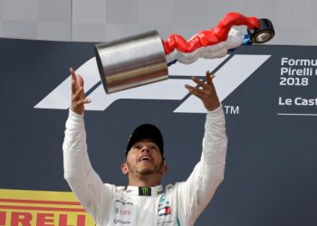 Lewis Hamilton celebrates with the French Grand Prix trophy, Sunday