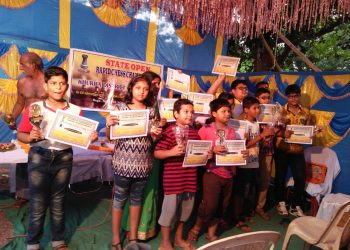 Winners of State Open Rapid Chess Championship pose with their trophies and certificates in Bhubaneswar, Sunday    