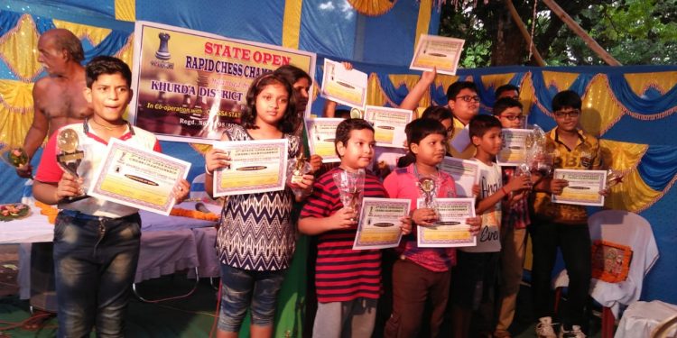 Winners of State Open Rapid Chess Championship pose with their trophies and certificates in Bhubaneswar, Sunday    