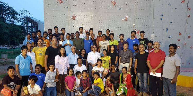 Participants and winners of various categories at the State Sports Climbing Championships pose with dignitaries and guests at the Kalinga Stadium complex, Sunday