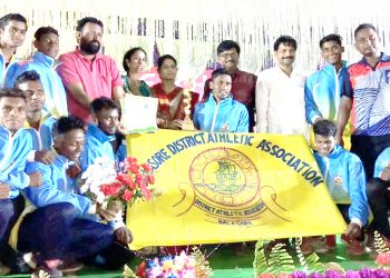 Balasore players pose with their winners’ trophies along with officials at Athgarh, Sunday    