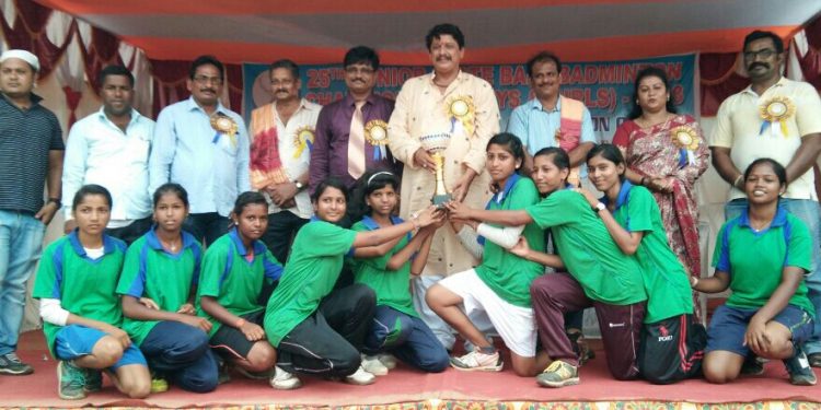Jagatsinghpur girls pose with their winners’ trophy along with guests at Puri, Thursday    