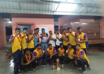 Odisha Kabaddi team players and officials pose with their medals and trophies Saturday     