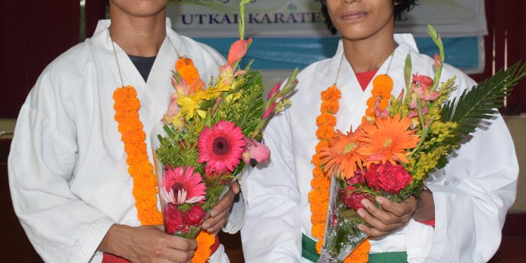 Anupama Swain (L) and Priyadarshini Ghatuary after the felicitation programme at the Utkal Karate School, Tuesday