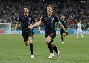 Luka Modric (R) celebrates with teammates after scoring against Argentina at the Nizhny Novgorod Stadium, Russia