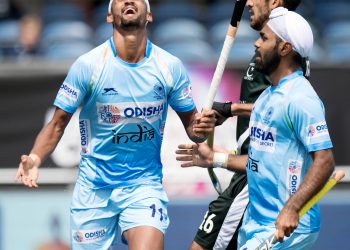 Mandeep Singh of India celebrates after scoring the third goal for India against Pakistan in the Champions Trophy encounter, Saturday