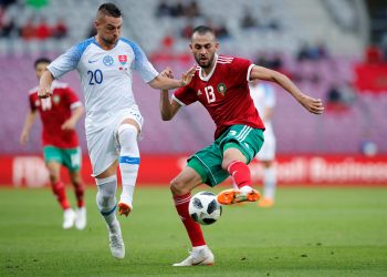 Morocco's Khalid Boutaib (R) vies for the ball with Slovakia’s Robert Mak during their international friendly match, Monday