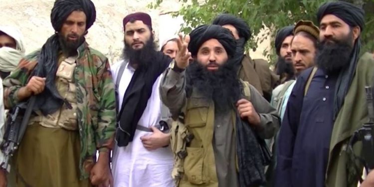 File pic of Pak Taliban chief Mullah Fazlullah (C) at an undisclosed location at Pak-Afghan border