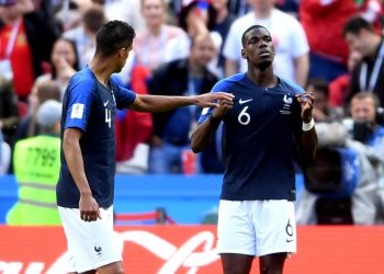 Paul Pogba (R) celebrates with a teammate after scoring France's second goal against Australia