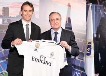 Real Madrid president Florentino Perez hands new manager the club jersey during the unveiling