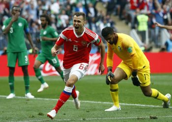 Denis Cheryshev celebrates after scoring for Russia in the World Cup opener against Saudi Arabia, Thursday