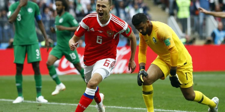 Denis Cheryshev celebrates after scoring for Russia in the World Cup opener against Saudi Arabia, Thursday