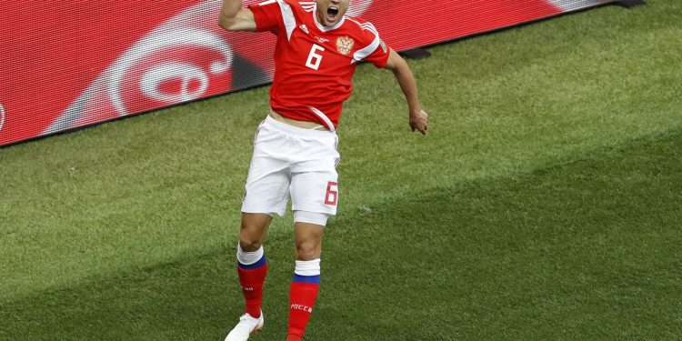 Denis Cheryshev celebrates after scoring against Saudi Arabia in their opening World Cup match at the Luzhniki stadium in Moscow, Thursday