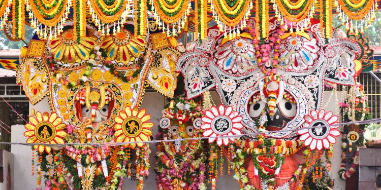 The trinity of Lords Balabhadra, Subhadra and Jagannath give darshan in Gajanana Besha after the annual ablution, Snana Yatra, Thursday.