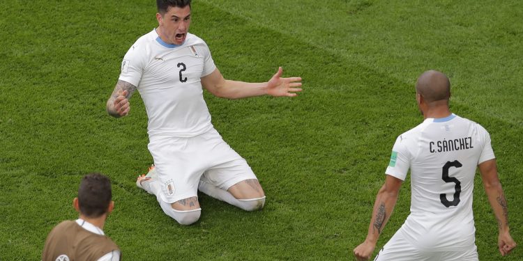 Uruguay’s Jose Gimenez (2) is joined by teammate Carlos Sanchez after the former’s goal against Egypt at Yekaterinburg, Friday