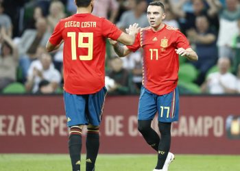Spain’s Iago Aspas (R) celebrates with teammate Diego Costa after scoring the winning goal against Tunisia, Saturday