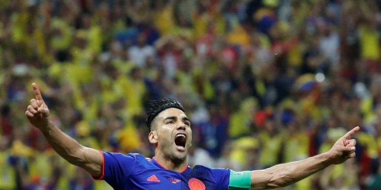Radamel Falcao celebrates after scoring his first ever World Cup goal against Poland, Sunday