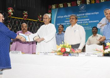 Chief Minister Naveen Patnaik hands over appointment Letter to a newly-recruited Odisha Civil Services Officer at Soochana Bhawan, Saturday