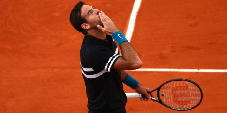 Juan Martin del Potro throws a kiss towards the sky after beating Marin Cilic at Roland Garros, Thursday