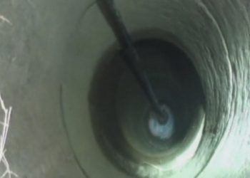 Mother jumps into well and saves her son