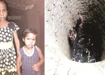 Girl jumps into well to save little sister