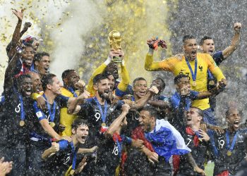 France players celebrate with the World Cup after beating Croatia in the final at Luzhniki Stadium in Moscow, Sunday