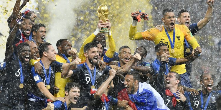 France players celebrate with the World Cup after beating Croatia in the final at Luzhniki Stadium in Moscow, Sunday