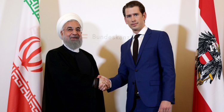 VIENNA, JULY 4:- Austria's Chancellor Sebastian Kurz shakes hands with Iran's President Hassan Rouhani at the Chancellery in Vienna, Austria July 4, 2018. REUTERS-29R
