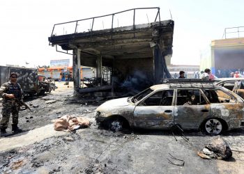 Afghan security forces inspect the site of a suicide attack in Jalalabad city, Afghanistan July 10, 2018. REUTERS/Parwiz