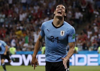 Edinson Cavani celebrates after scoring the opener against Portugal at the Fisht Stadium in Sochi