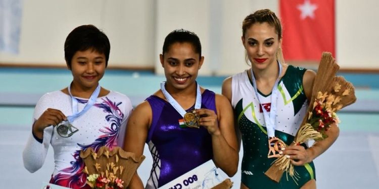 Dipa Karmakar (C) and other winners pose with their medals at Mersin, Turkey, Sunday
