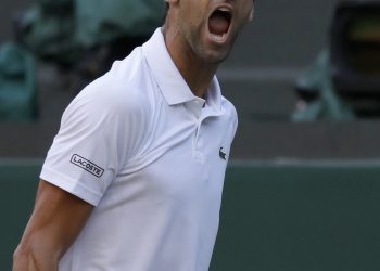 Novak Djokovic reacts after beating Kyle Edmund in London, Saturday