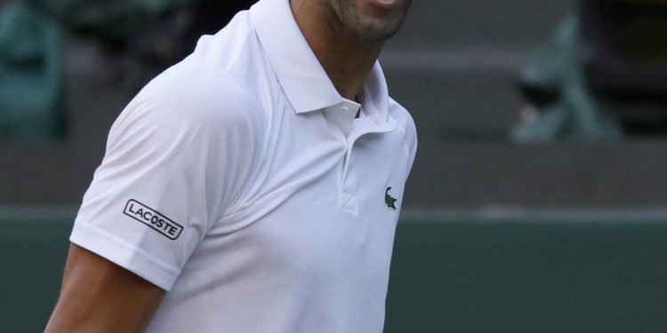 Novak Djokovic reacts after beating Kyle Edmund in London, Saturday