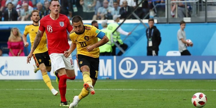 Belgium captain Eden Hazard (10) shoots to score his side’s second goal against England and help the nation achieve their best ever World Cup show 