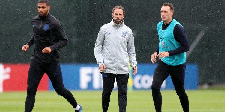 England coach Gareth Southgate (in jacket) looks on during an England training session, Thursday