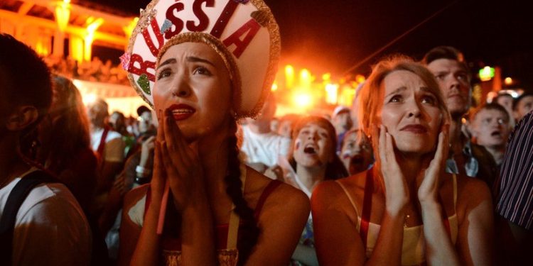 Russian fans react to their team’s loss to Croatia at the World Cup quarterfinals, Saturday