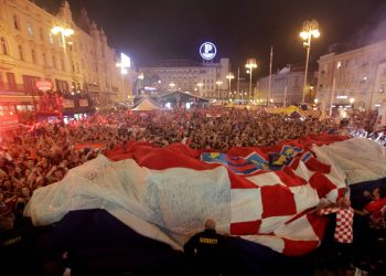 Croatia fans celebrate at the end of the semifinal win over England, in Zagreb, Wednesday