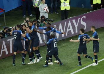 Franch players celebrate Samuel Umtiti's goal against Belgium in the World Cup semifinal at  St. Petersburg Stadium, Tuesday