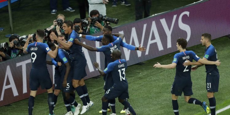 Franch players celebrate Samuel Umtiti's goal against Belgium in the World Cup semifinal at  St. Petersburg Stadium, Tuesday