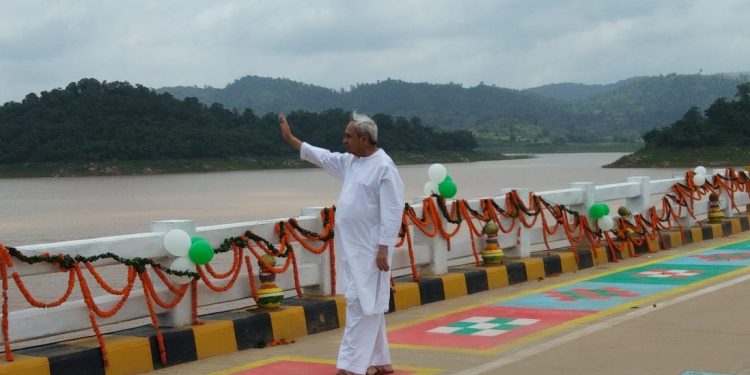 CM Naveen Patnaik waves at people gathered for the opening of Gurupirya bridge